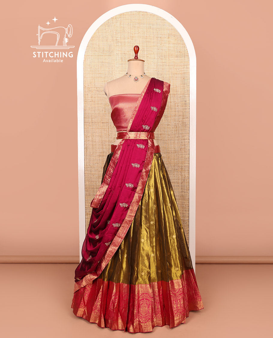 Gold-magenta zari buttas half-saree with contrast intricate motifs woven bordered skirt, brocade blouse, and a zari design dhavani