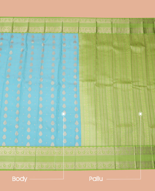 Blue Budget Silk Saree Adorned with Zari Buttas, Complemented with a Contrast Peacock Zari Design Border, Pallu Steeped with Traditional Zari Designs, and Paired with a Contrast Blouse