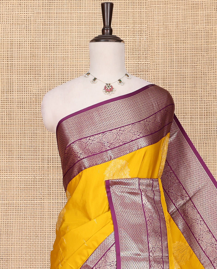 Yellow Budget Silk Saree, Subtly Sparkled with Zari Buttas All Over Its Body, Complemented by a Contrast Traditional Zari Design Border of Floral Creeper Designs, an Intricate Jaal Design Pallu, and Paired with a Contrast Blouse