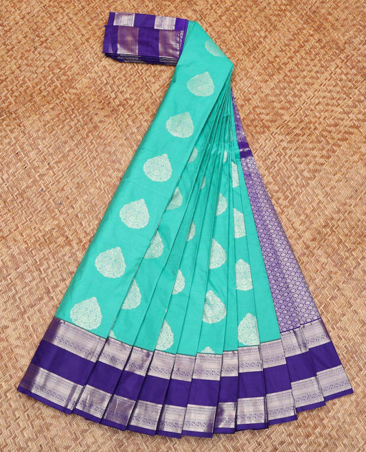Blue Budget Silk Saree, Entralled with Zari Buttas All Over Its Body, Complemented by Contrast Traditional Zari Designs Woven Rettai Pettu Border, Grand Pallu and Paired with a Contrast Blouse