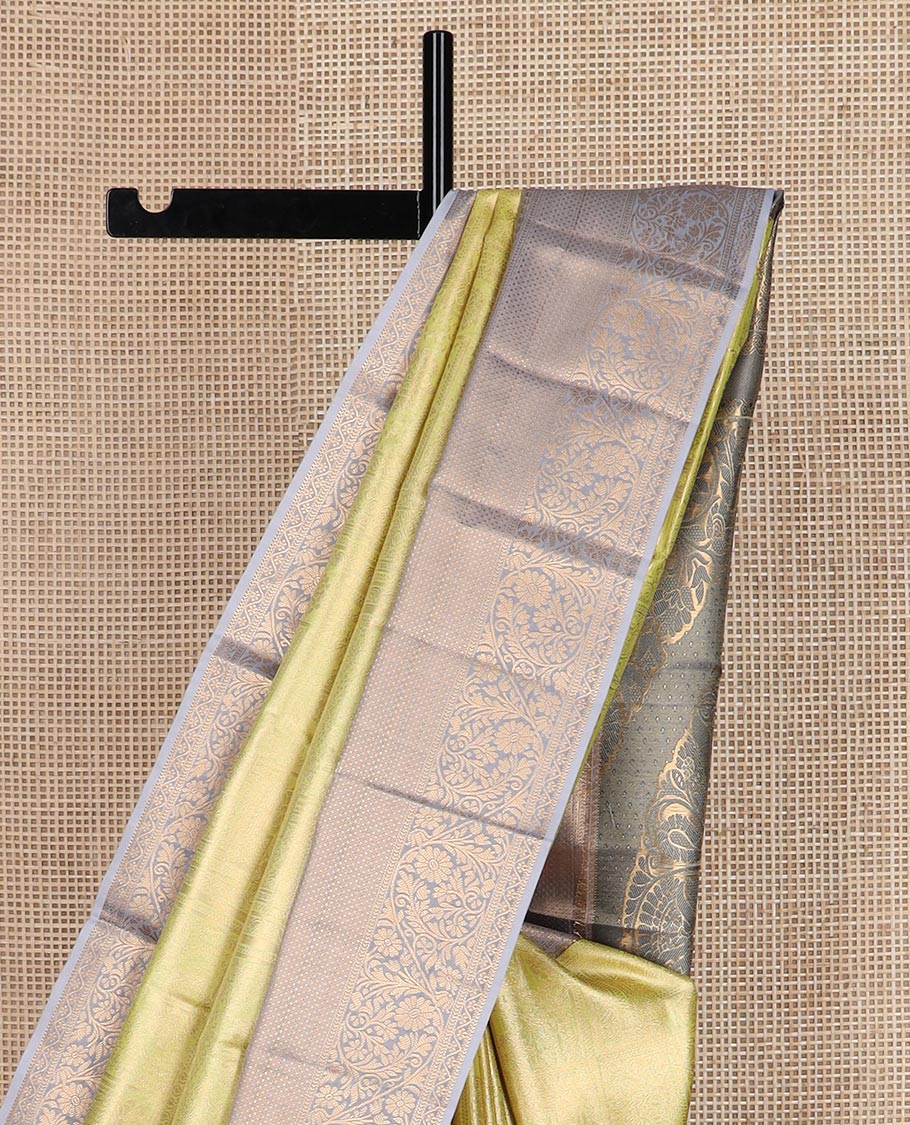 Yellow Mughal style zari jacquard budget silk saree, contrast traditional zari border, and pallu of Mughal inspired intricate motifs
