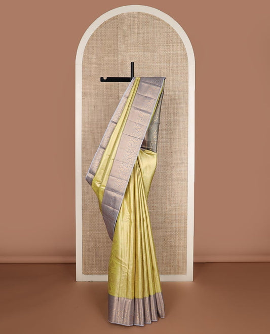 Yellow Mughal style zari jacquard budget silk saree, contrast traditional zari border, and pallu of Mughal inspired intricate motifs