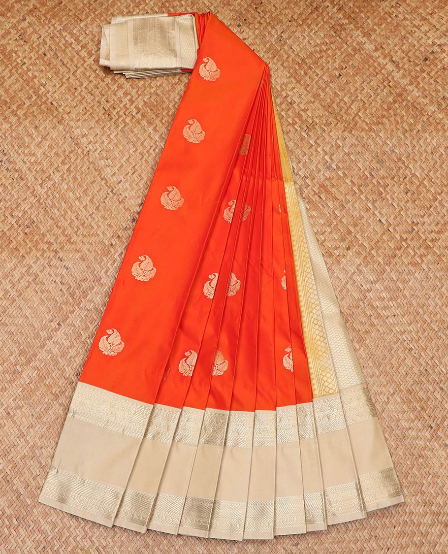 Orange zari buttas gift saree, contrast traditional zari design rettai pettu border, and jaal pallu