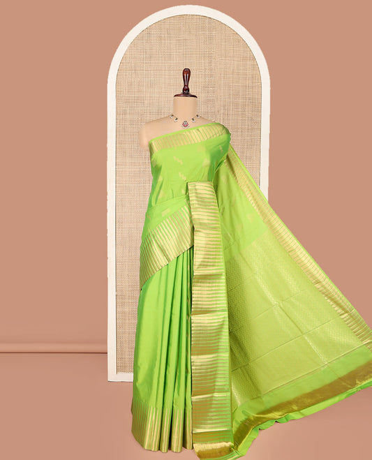 Parrot Green Budget Silk Saree, Sparsely Woven with Zari Buttas All Over Its Body, Highlighted by Temple Zari Border, Gleaming Chevron-Patterned Pallu, and Paired with a Matching Blouse