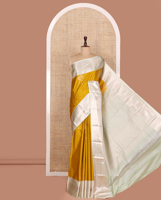 Mustard Budget Silk Saree, Accentuated with Zari Buttas All Over Its Body, Complemented by a Contrast Border of Traditional Zari Designs, Grand Pallu of Intricate Designs, and Paired with a Contrast Blouse