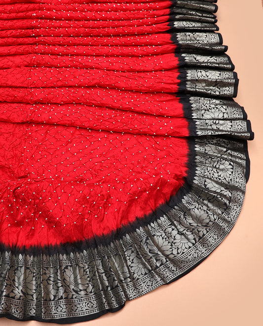 Red bandhani silk saree with contrast zari design border & floral design pallu