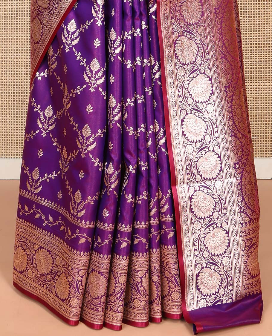 Violet Semi-Banaras Saree, Gracefully Embellished with Jaal Jacquard on Its Body, Highlighted by Floral Creeper Design Border, Intricately Designed Pallu, and Paired with a Matching Blouse