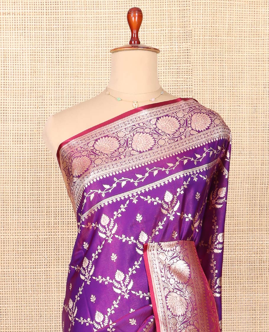 Violet Semi-Banaras Saree, Gracefully Embellished with Jaal Jacquard on Its Body, Highlighted by Floral Creeper Design Border, Intricately Designed Pallu, and Paired with a Matching Blouse