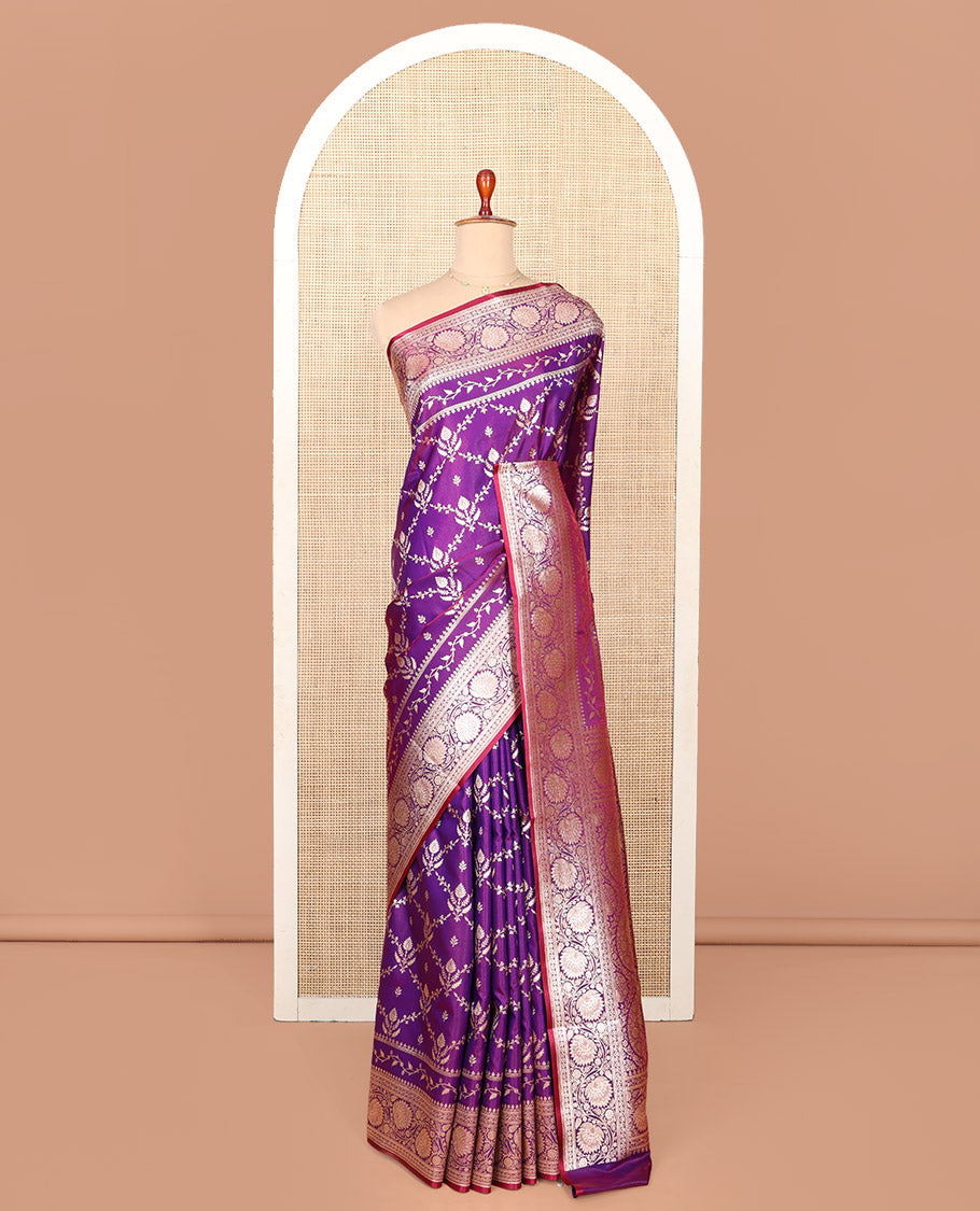 Violet Semi-Banaras Saree, Gracefully Embellished with Jaal Jacquard on Its Body, Highlighted by Floral Creeper Design Border, Intricately Designed Pallu, and Paired with a Matching Blouse