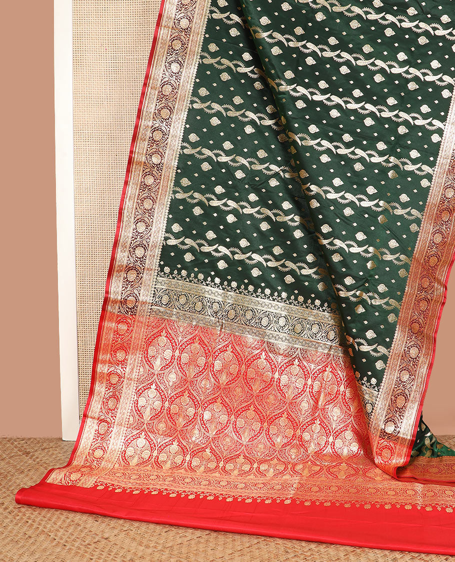Green zari buttas and leaf vine banarasi silk saree, contrast floral creeper design border, and intricate ogee patterned pallu