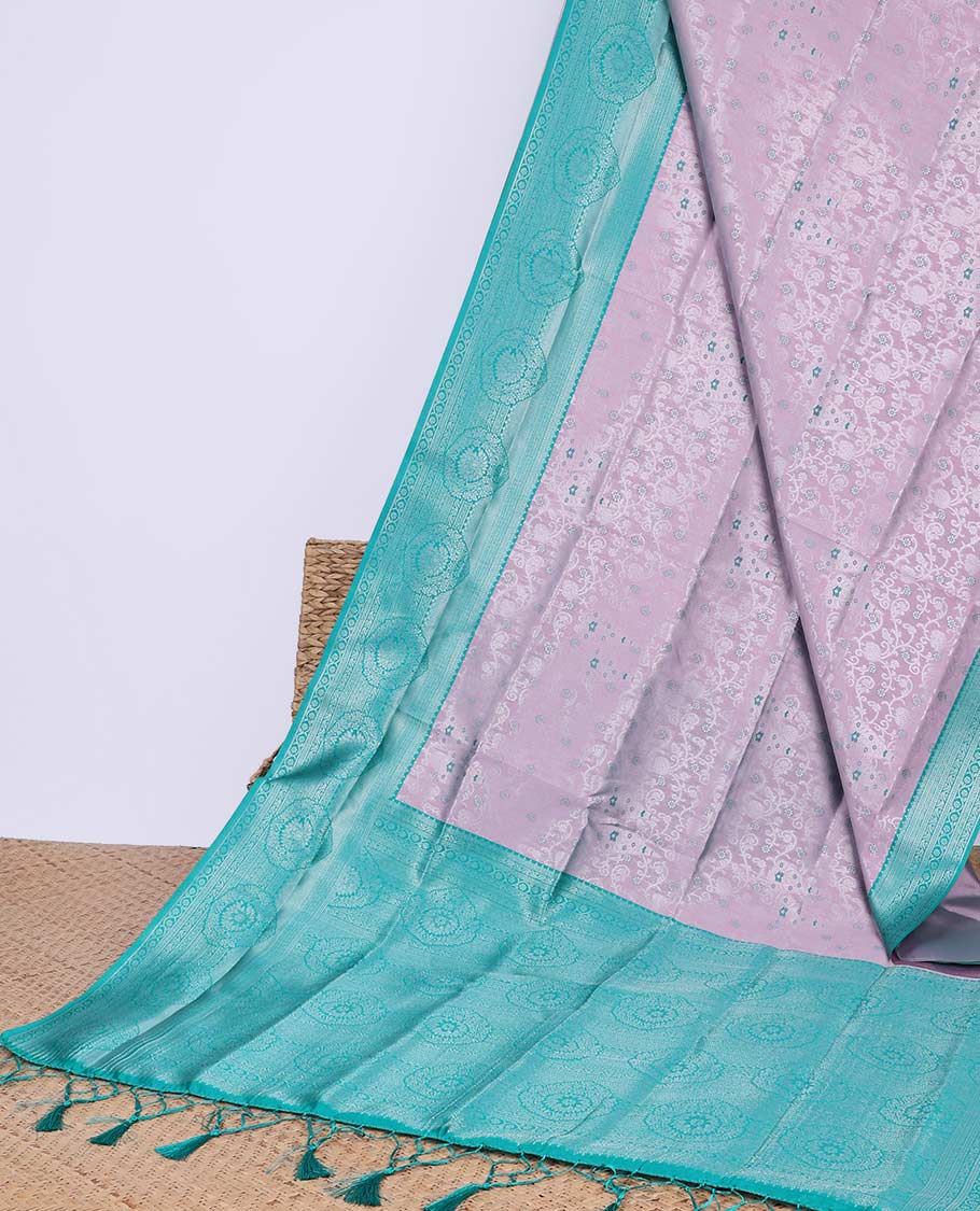 Green floral butter silk saree with contrast floral design border & pallu of floral jaal design