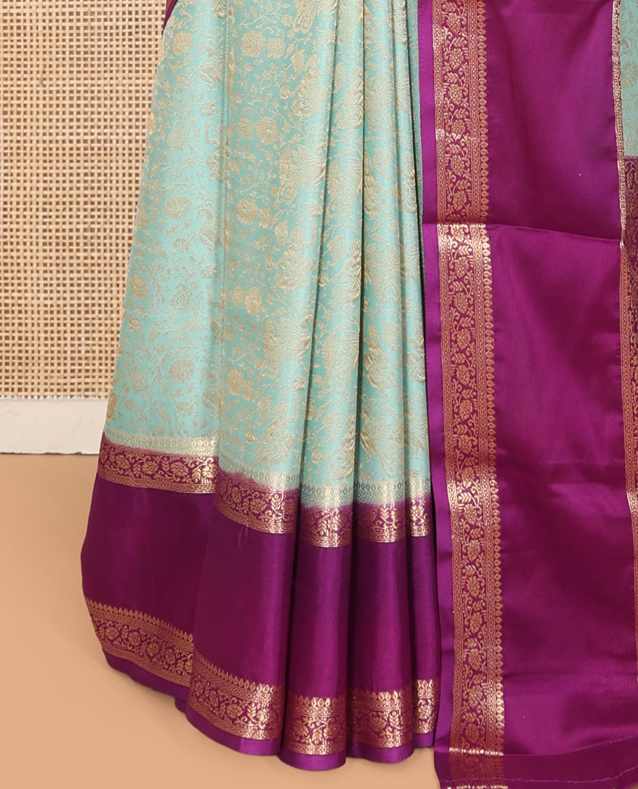 Turquoise Fancy Crepe Saree, Mesmerized with Floral Vine and Peacock Design, Complemented by a Contrast Traditional Zari Design Border, Intricately Designed Pallu, and Contrast Blouse