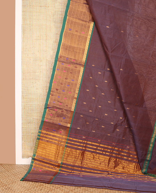 Brown Venkatagiri Cotton Saree, Elevated with Buttas on Its Body, Complemented by Contrast Border of Zari and Thread Designs, Gleaming Striped Pallu, and Comes Without a Blouse