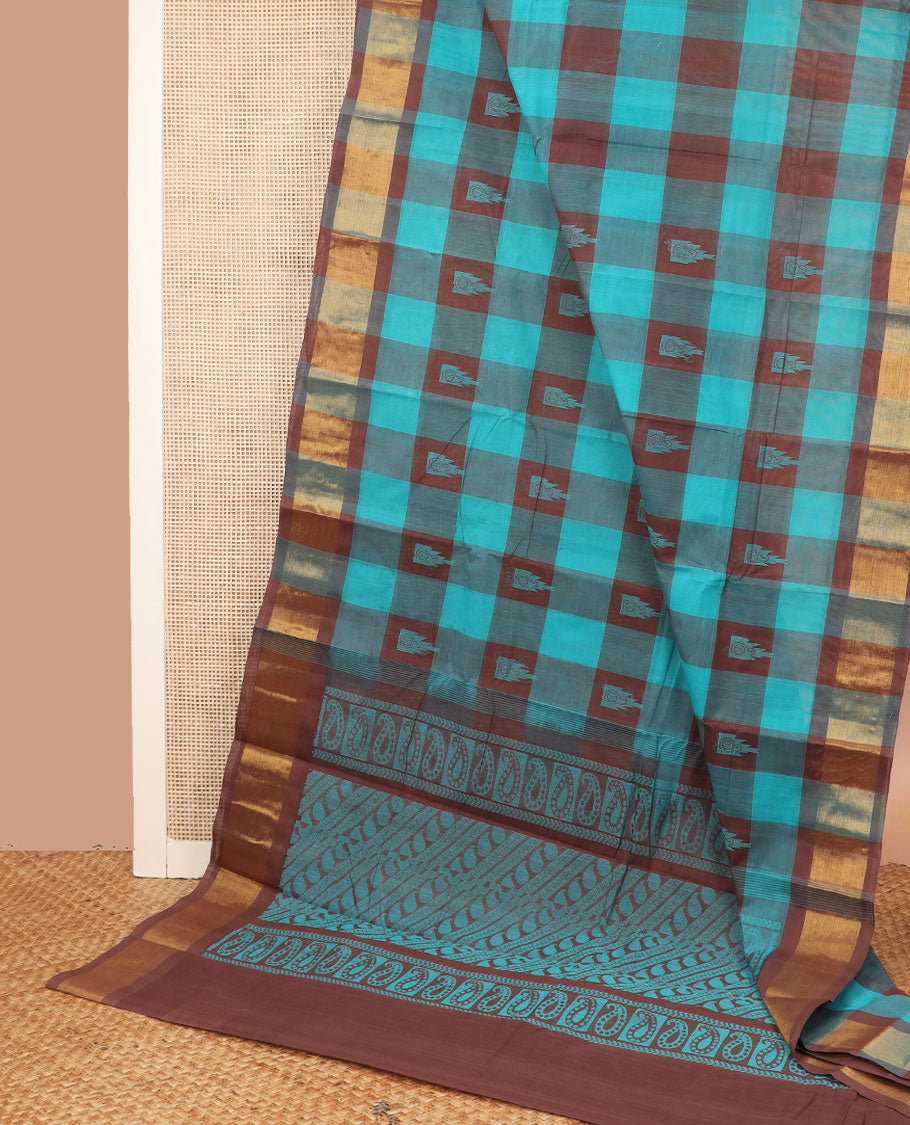 Multi-color temple buttas enclosed checked Kanchi cotton saree, zari border, and pallu of paisley designs pallu