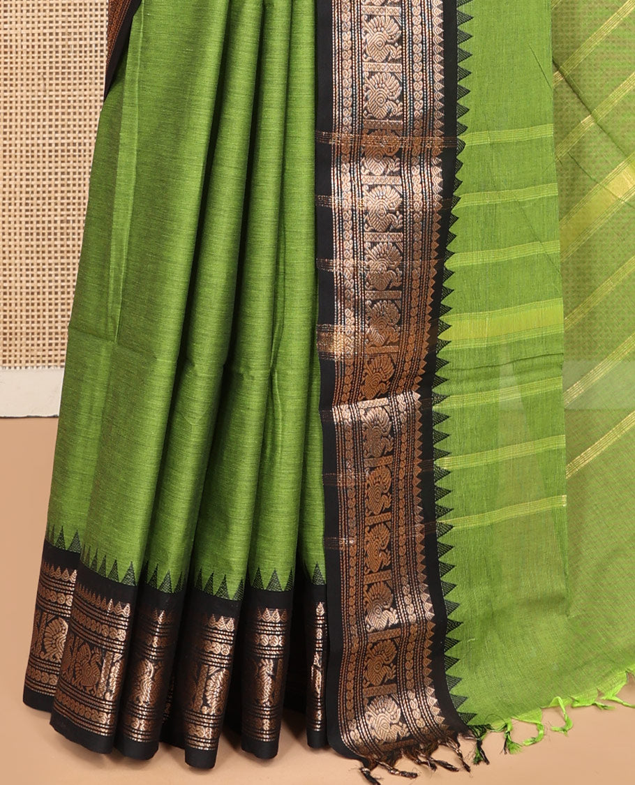 Green Plain Chettinad Cotton Saree, Enhanced by a Contrast Traditional Temple Peacock Border, a Striped Pallu and a Matching Blouse