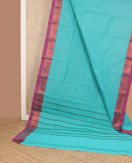 Turquoise micro-checked Chettinad cotton saree, contrast floral motif border & striped pallu
