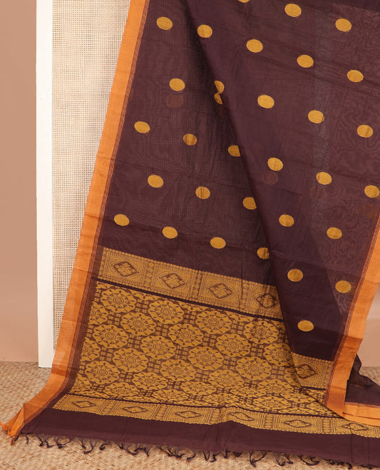 Brown polka dot buttas kanchi cotton saree, contrast border, and chakram design pallu
