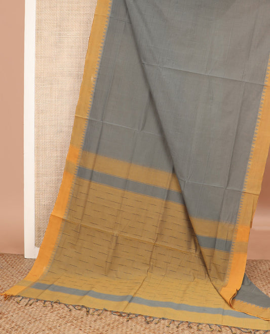 Grey buttas Andhra cotton saree, contrast temple border, and pallu of buttas