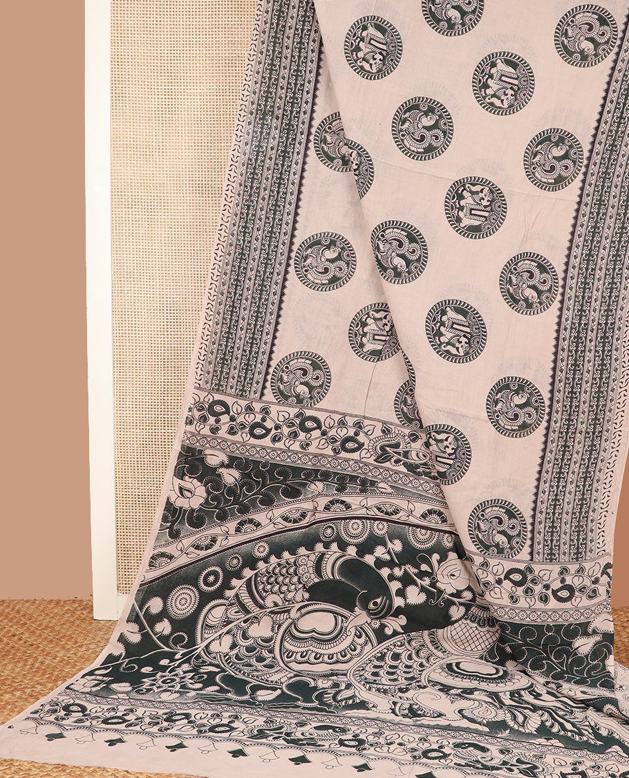 Cream round butta machine-printed kalamkari cotton saree, contrast geometric printed border, and pallu of kalamkari peacocks