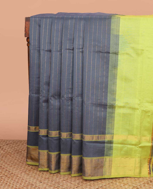 Grey striped poly cotton saree, contrast bavanji zari border, and striped pallu