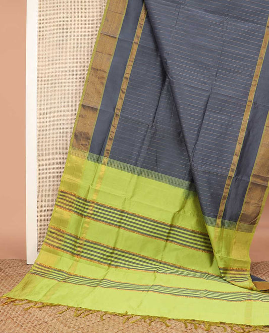 Grey striped poly cotton saree, contrast bavanji zari border, and striped pallu