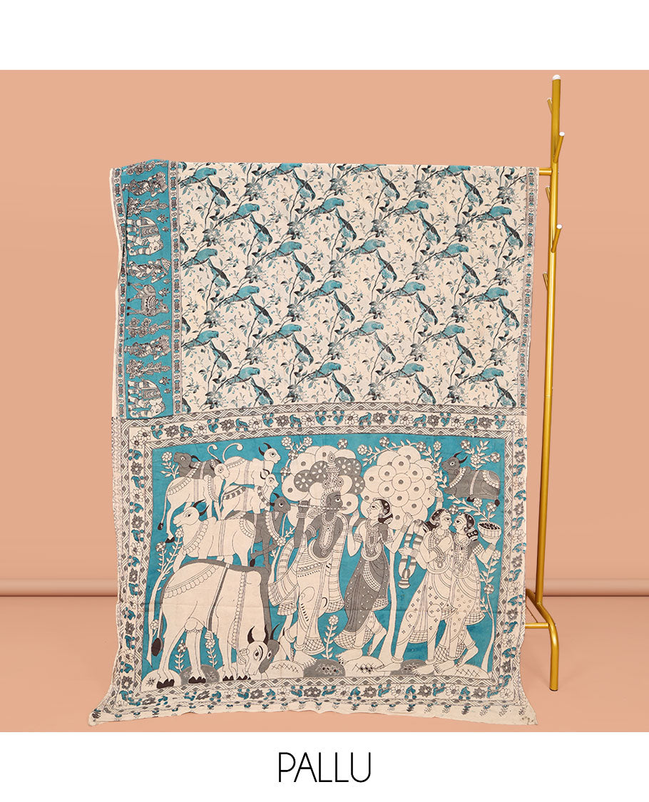 Beige-Base Machine-Printed Kalamkari Cotton Saree, Elevated with Floral and Bird Motifs on Its Body, Complemented by a Contrast Border, Pallu of Radha Krishnan Motifs Print, and Paired with a Printed Blouse