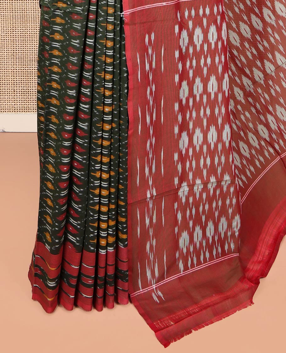 Green Ikkat Cotton Saree, Elevated with Ikkat-Style Ogee Patterns on Its Body, Complemented by Contrast Ikkat-Style Border, Pallu of Ikkat Buttas, and Has No Blouse