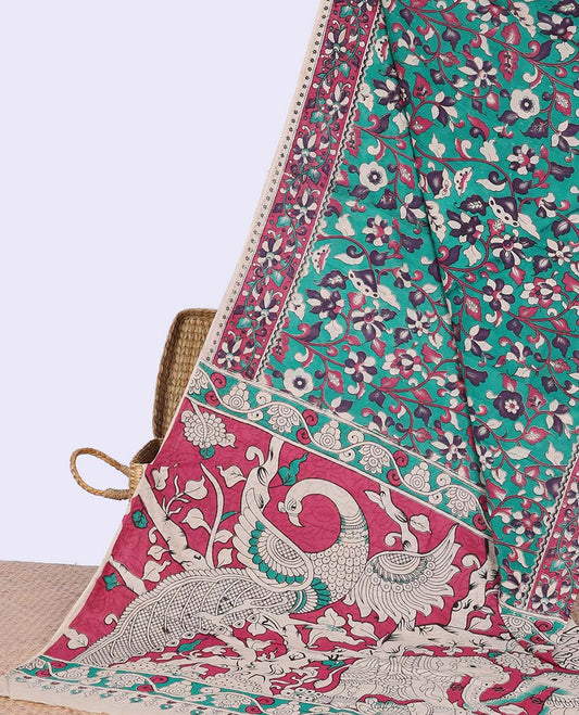 Green floral vine design machine-printed kalamkari cotton saree with contrast floral border & peacock design pallu