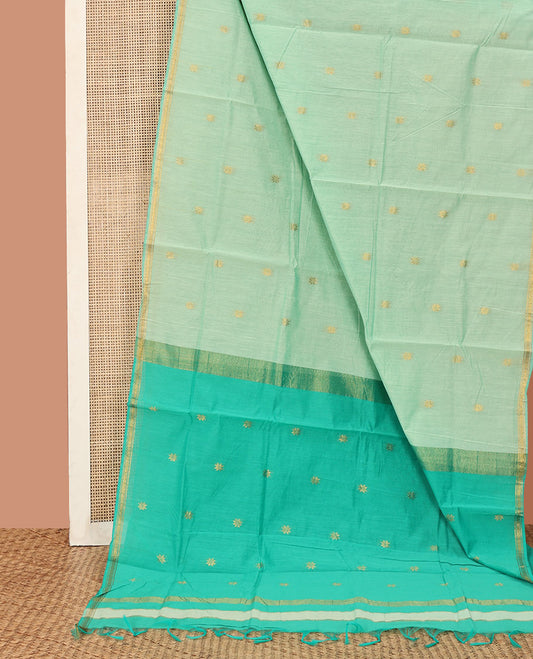 Green Maheshwari Cotton Saree, Elevated with Flower Buttas All Over Its Body, Subtly Woven Piping Border, Captivating Contrast Pallu Steeped with Buttas, and Paired with a Contrast Blouse