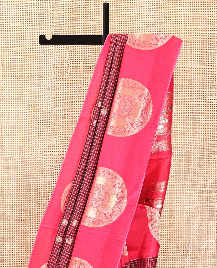 Maroon H O-Silk Saree, Elegantly Detailed with Zari Buttas and Zari Checks On Its Body, Accentuated with Contrast Big Chakram Motifs Woven Border, Grand Jaal Design Woven Pallu, and Paired with a Checked Blouse
