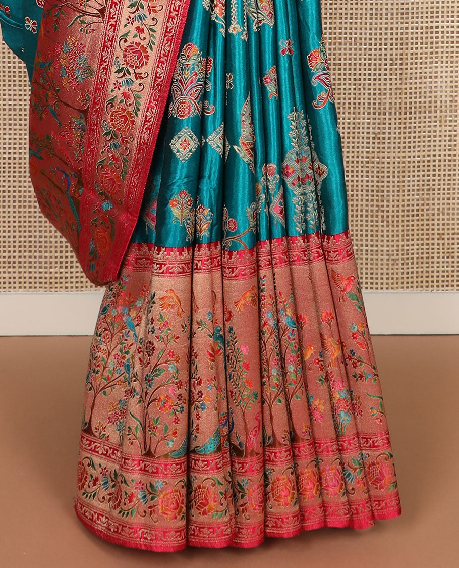 Blue meenakari-style floral printed dola satin silk saree, contrast Tree of life with birds printed border & Mughal-style pallu