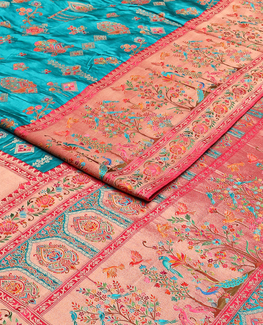 Blue meenakari-style floral printed dola satin silk saree, contrast Tree of life with birds printed border & Mughal-style pallu
