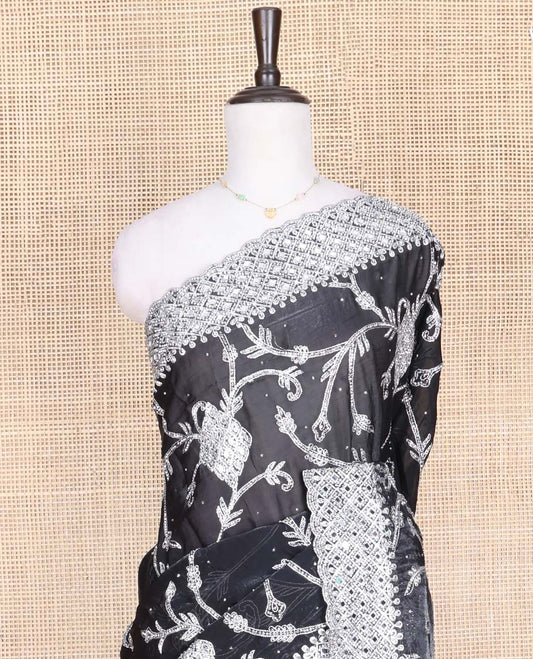 Black Designer Saree, Richly Detailed with Floral-Jaal Style Mixed Embroidery on Its Body, Highlighted by Jaal-Patterned Scallop Embroidered Border, Self-Design Pallu, and Paired with a Heavy Embroidered Matching Blouse