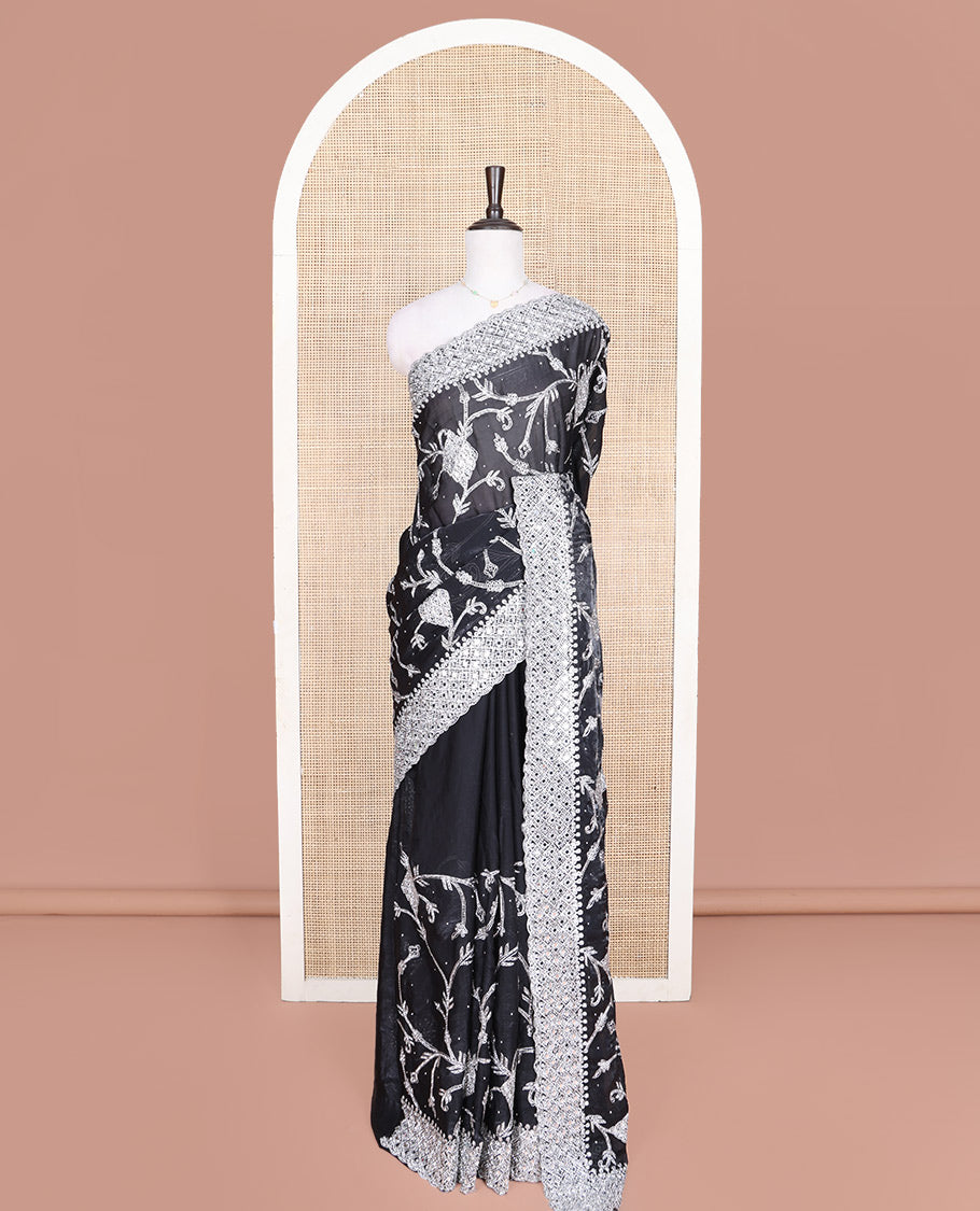 Black Designer Saree, Richly Detailed with Floral-Jaal Style Mixed Embroidery on Its Body, Highlighted by Jaal-Patterned Scallop Embroidered Border, Self-Design Pallu, and Paired with a Heavy Embroidered Matching Blouse