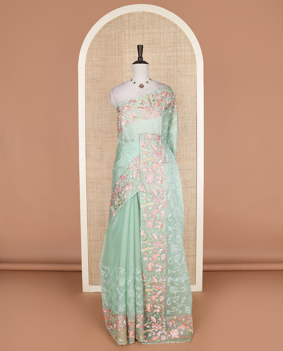 Green floral vine embroidered with stone work designer saree, scallop floral vine and birds embroidered border