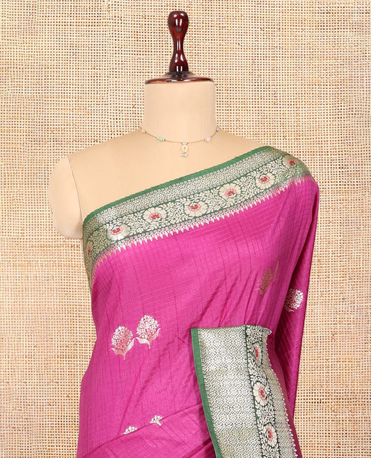 Rani Pink Raw mango Silk Saree, Subtly Sparkled with Checks and Floral Buttas, a Contrast Floral Creeper Border, Intricate Pallu, and a Contrast Blouse