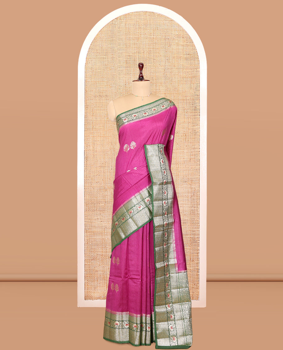 Rani Pink Raw mango Silk Saree, Subtly Sparkled with Checks and Floral Buttas, a Contrast Floral Creeper Border, Intricate Pallu, and a Contrast Blouse