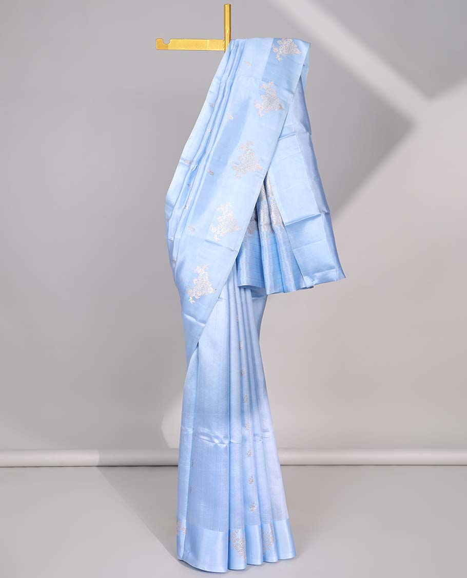 Blue floral buttas raw mango silk saree with self floral border & jaal zari design pallu