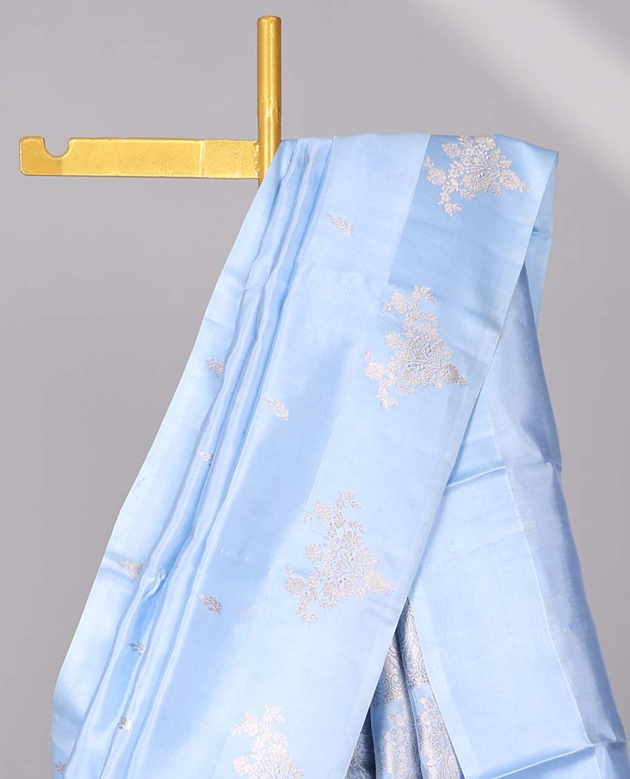 Blue floral buttas raw mango silk saree with self floral border & jaal zari design pallu