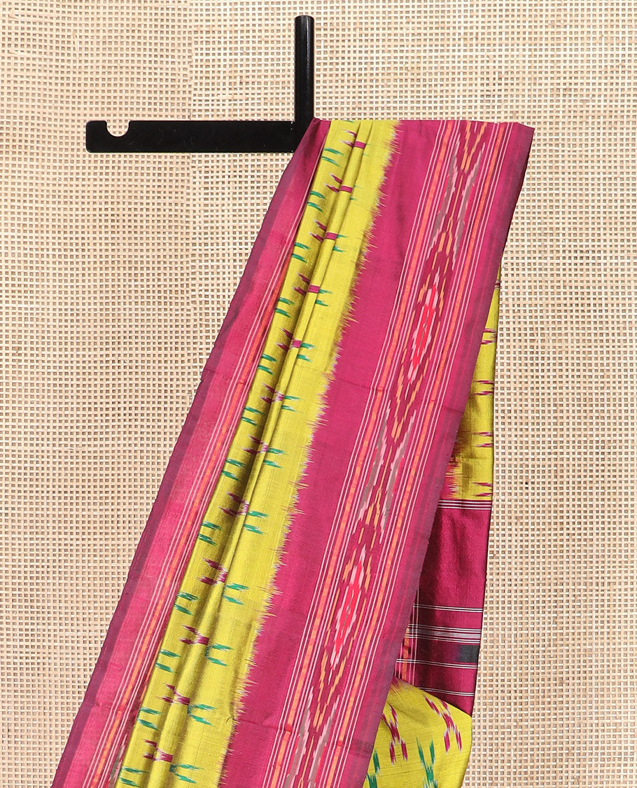 Yellow Ikkat Silk Saree with Cross Buttas Across the Body, Highlighted by a Captivating Contrast Ikkat-Textured Border, Featuring a Pallu Designed with Stripes and Ikkat Texture