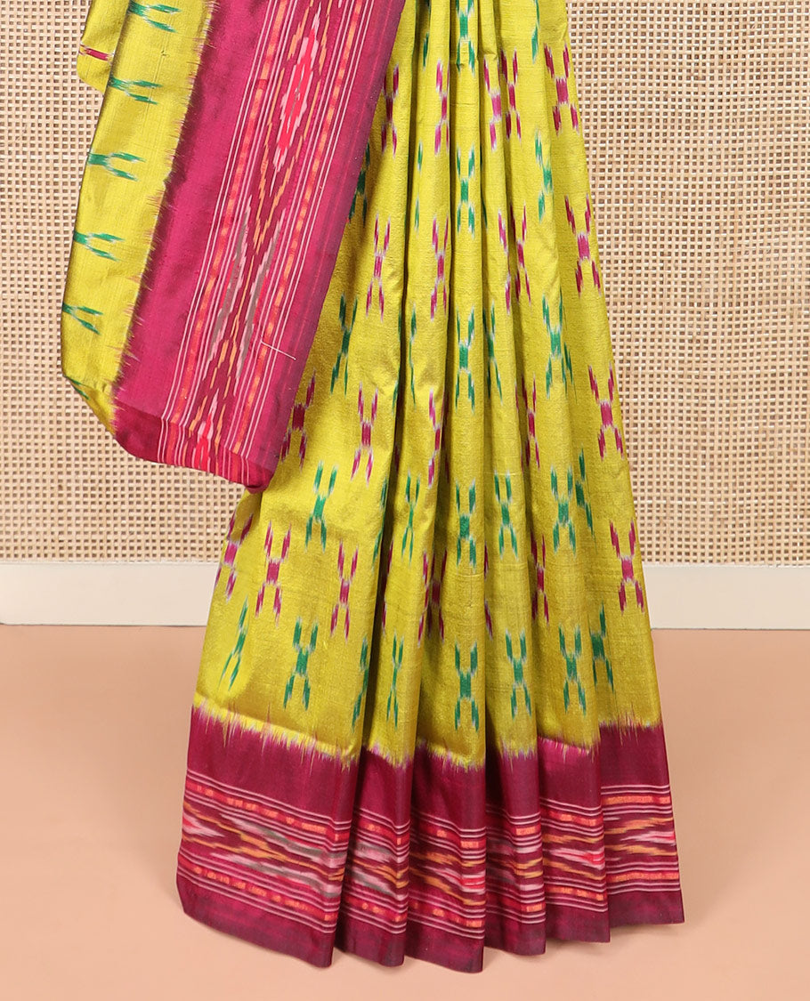 Yellow Ikkat Silk Saree with Cross Buttas Across the Body, Highlighted by a Captivating Contrast Ikkat-Textured Border, Featuring a Pallu Designed with Stripes and Ikkat Texture
