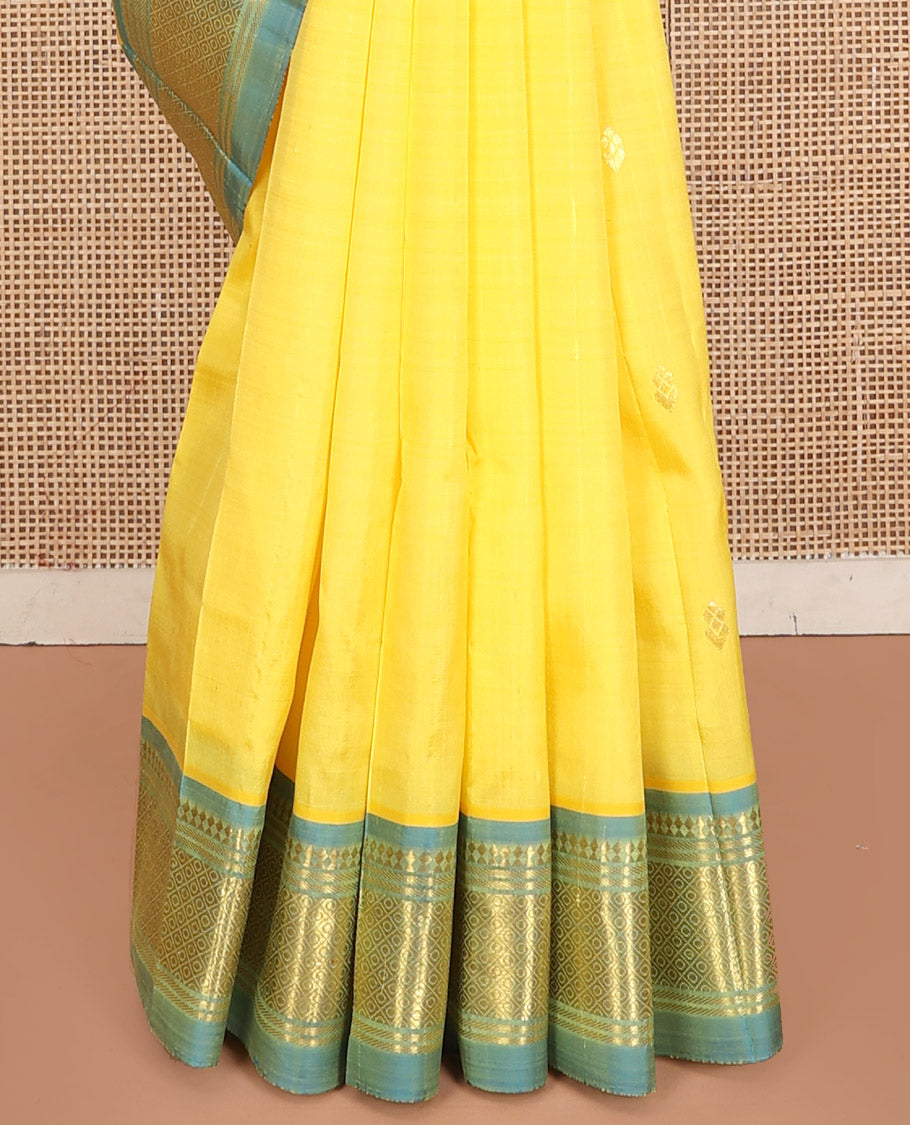 Yellow Kanchipuram Silk Saree, Subtly Sparkled with Zari Buttas, Contrast One-Sided Border of Paneer Sombu, Banaras, and Mayil Kann, Zari Design Pallu, and No Blouse