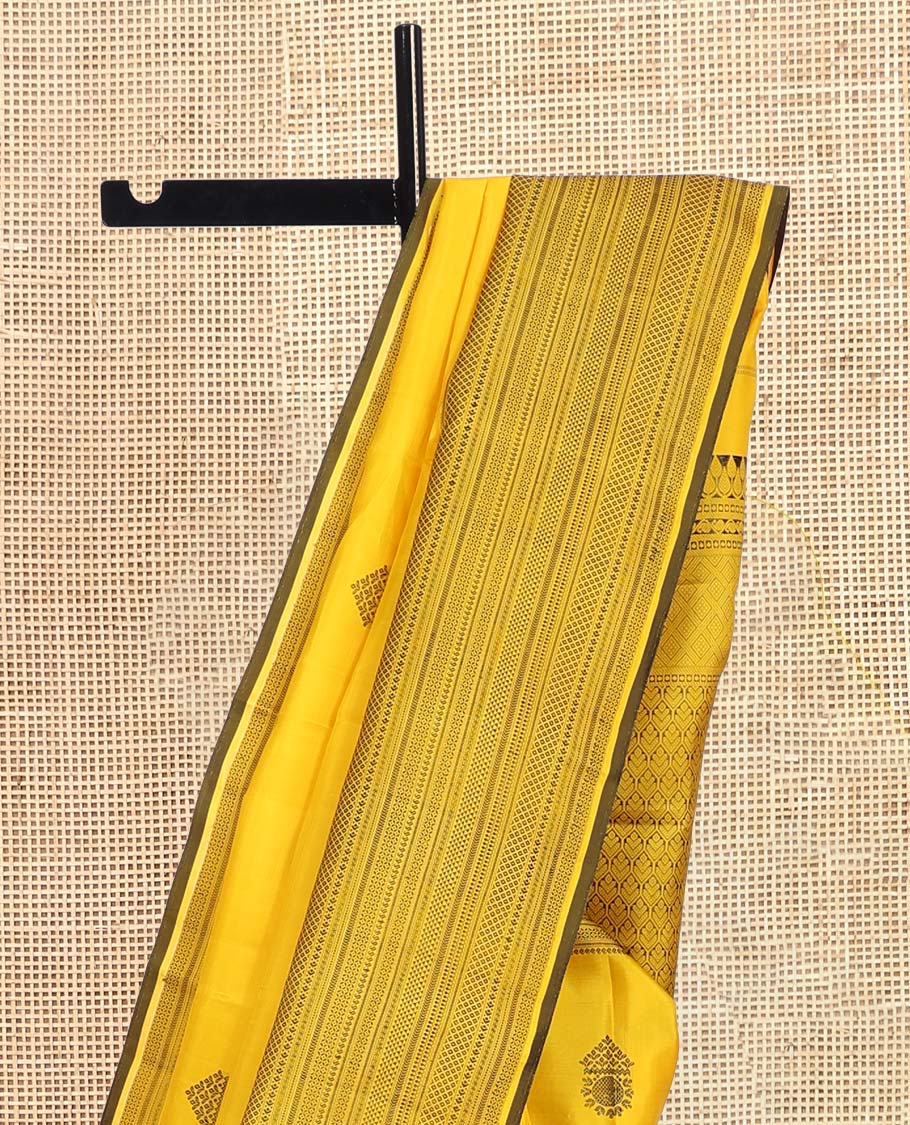 Yellow Kanchipuram Silk Saree, Crafted with Thread Buttas, a Self-Border of Manga, Ara Maadam, Kathir, Mayil Kann, Jaal Pallu, and a Matching Blouse