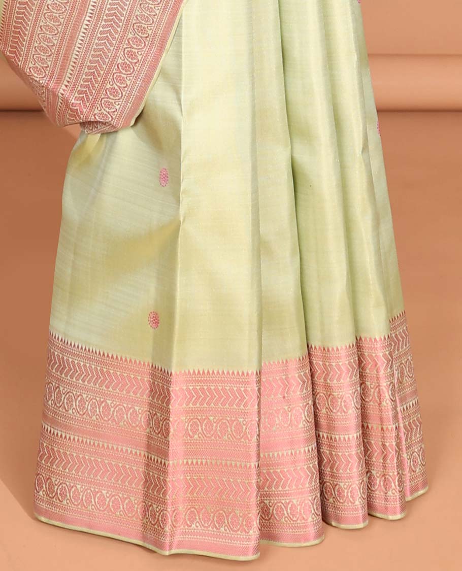 Mint green buttas kancheepuram silk saree with contrast border of rekku, muthu, banaras, poo chakram design & zari design pallu