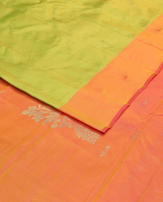 Green kancheepuram silk saree with contrast floral design border & floral motifs pallu