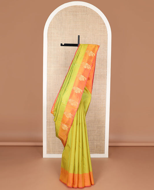 Green kancheepuram silk saree with contrast floral design border & floral motifs pallu