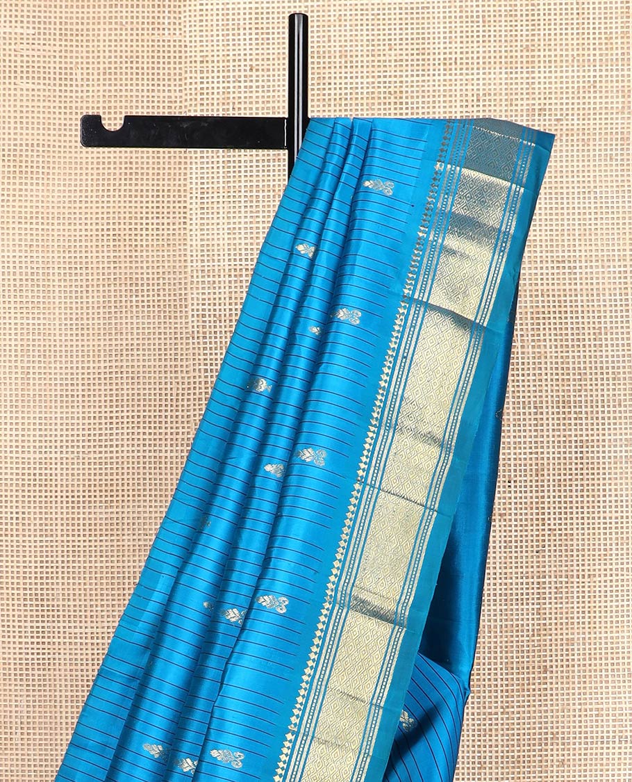 Blue striped & zari buttas Kanchipuram silksaree, one-sided border of panner sombu,banaras,muthu & jaal designs & zari design pallu