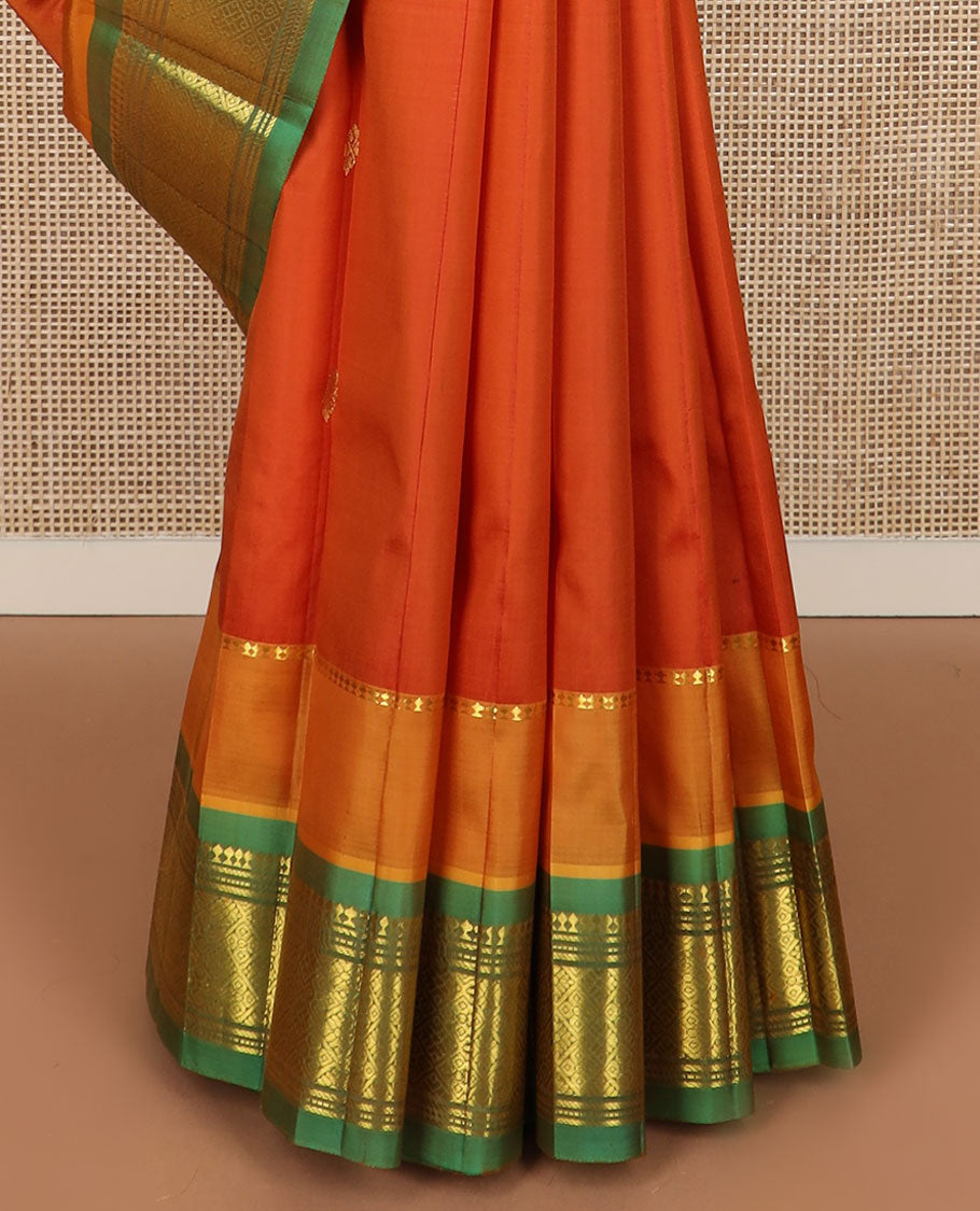 Orange zari buttas Kanchipuram silk saree, contrast border of panner sombu, banaras, muthu & jaal design & pallu of floral & jaal design