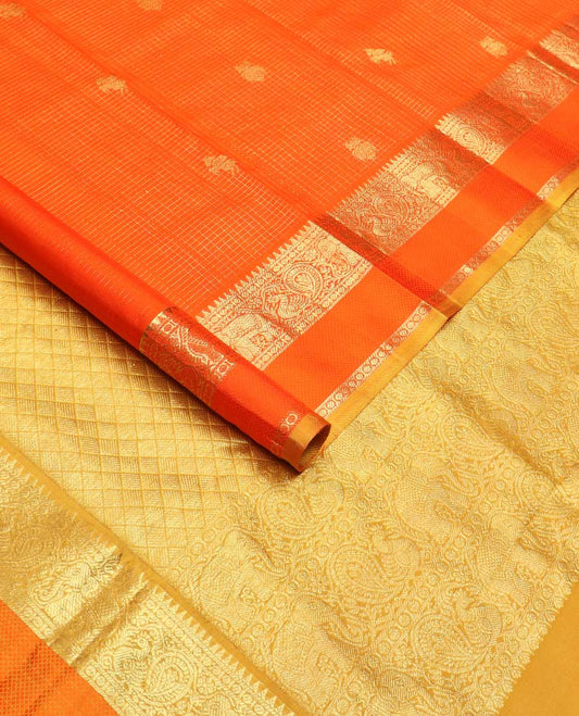 Orange checked with kuthirai and iruthalai pakshi buttas Kanchipuram silk saree, zari border of rekku, paisa, yaanai, mayil, and mayil kann, and paiyadi kattam pallu