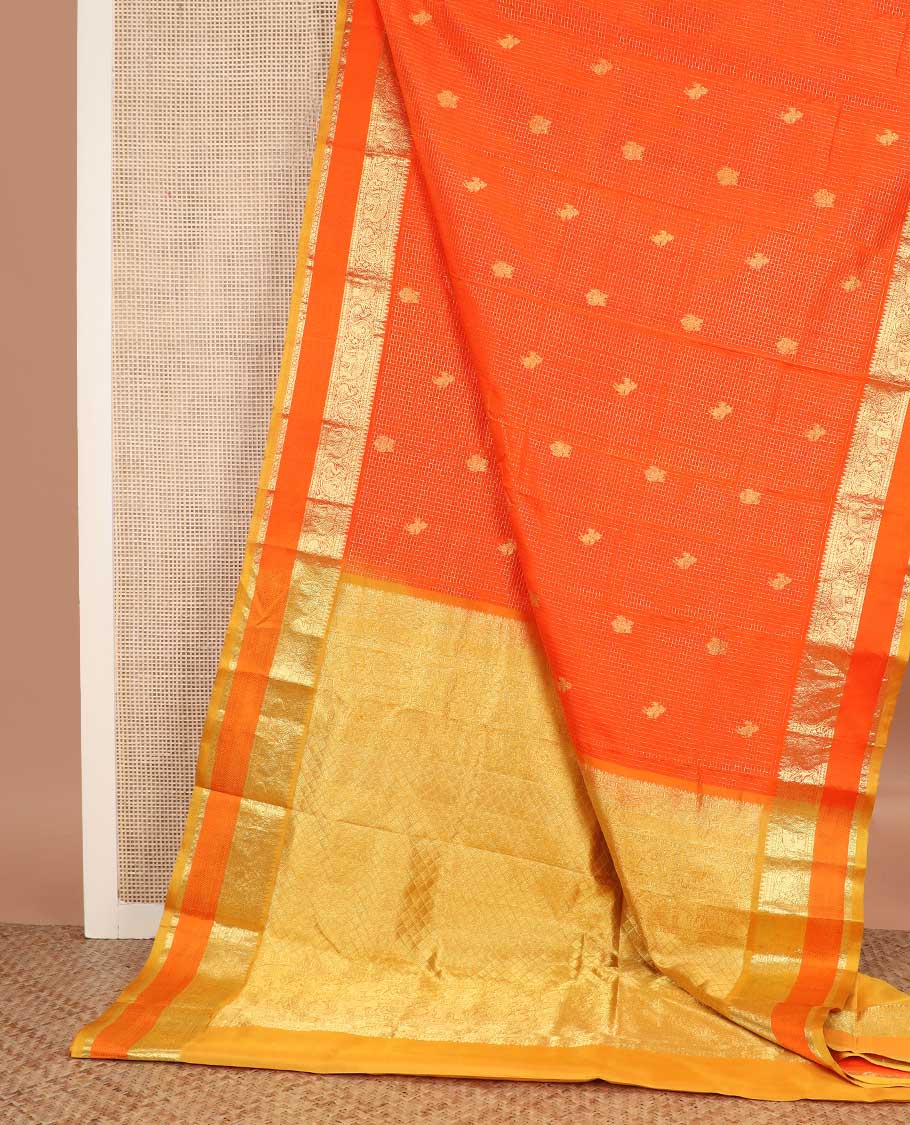 Orange checked with kuthirai and iruthalai pakshi buttas Kanchipuram silk saree, zari border of rekku, paisa, yaanai, mayil, and mayil kann, and paiyadi kattam pallu